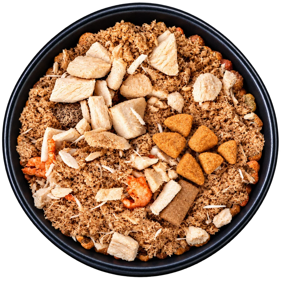 A bowl of SuperMeal: freeze-dried chicken, krill and superfoods, seen from above